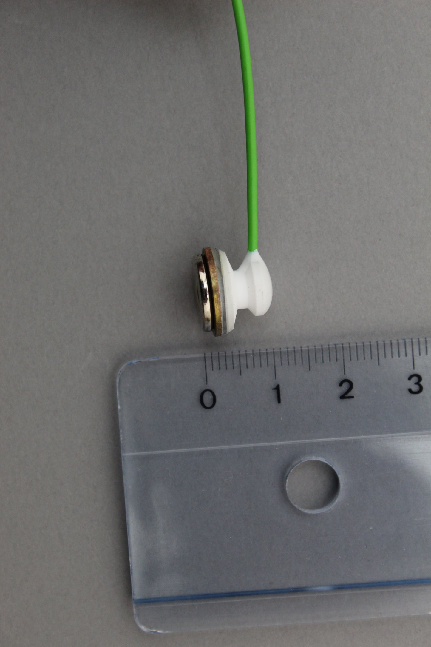 Snap button cable for disposable pad electrodes