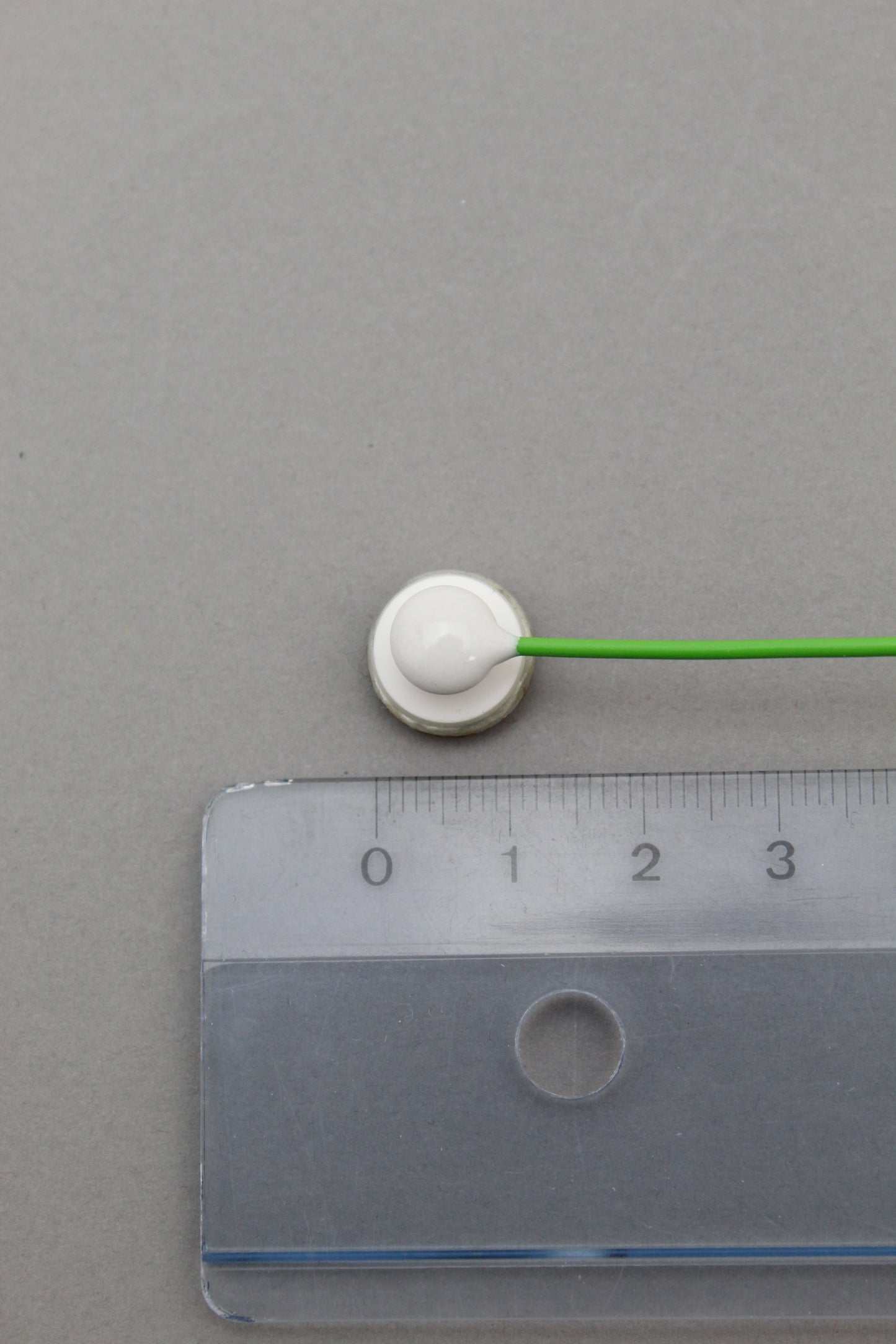 Snap button cable for disposable pad electrodes